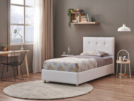 Somni baza 2 in 1 in wit als eenpersoonsbed, in een slaapkamer met bureau