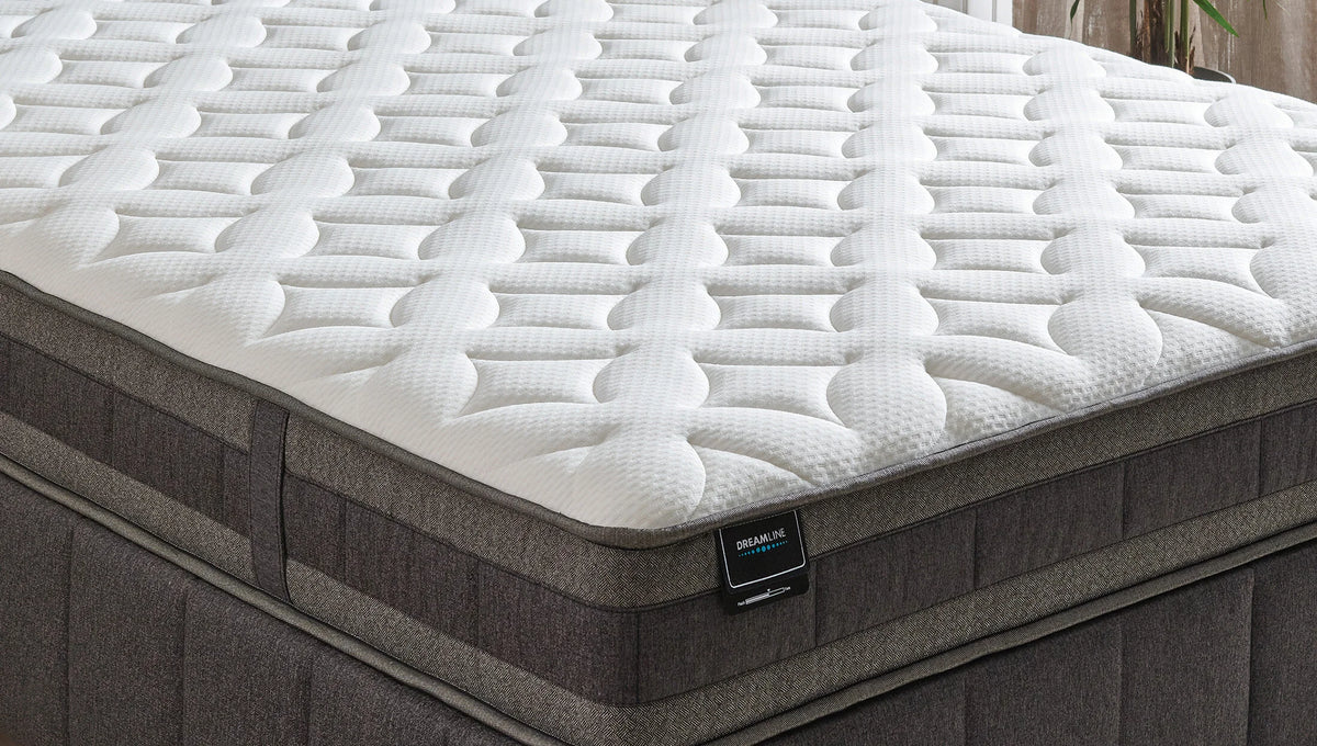 Dream Line matras van dichtbij, met zicht op de gewatteerde toplaag en de baza