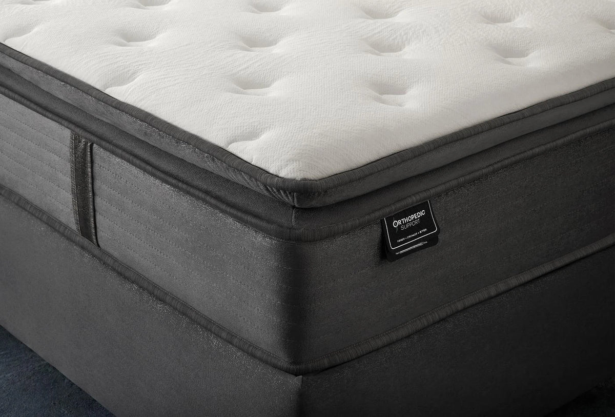 Hoek van het Orthopedic Support matras met grijze zijkant en label