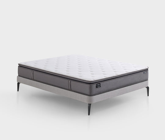 Orthopedic Support ProPocket 2.1 matras op een grijze bedbodem met zwarte poten